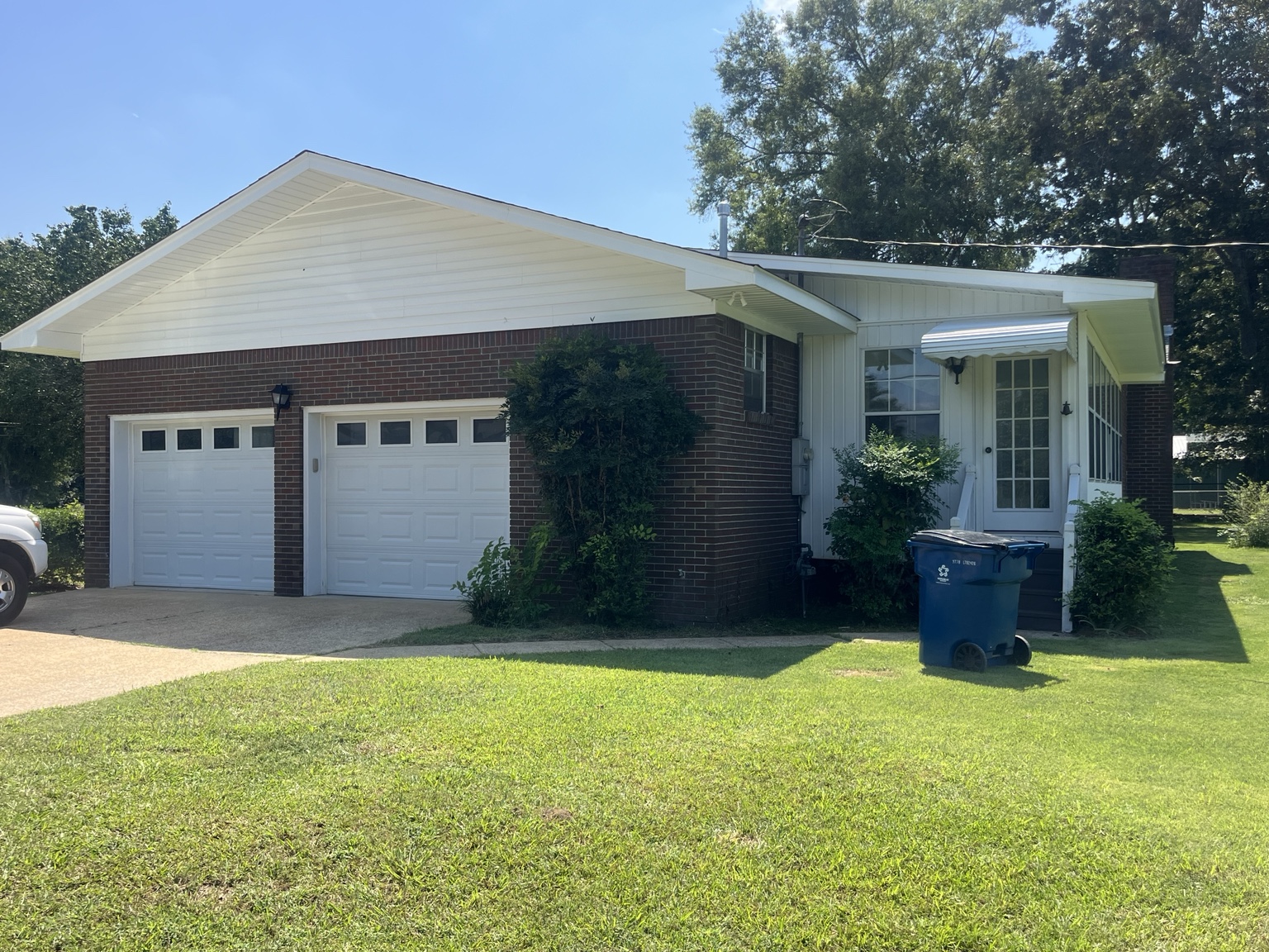 Exterior view showing both garage doors